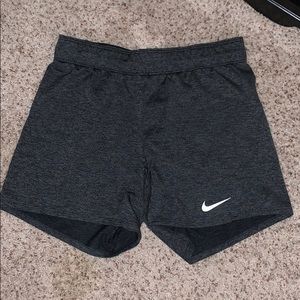 Nike shorts in a charcoal/black color